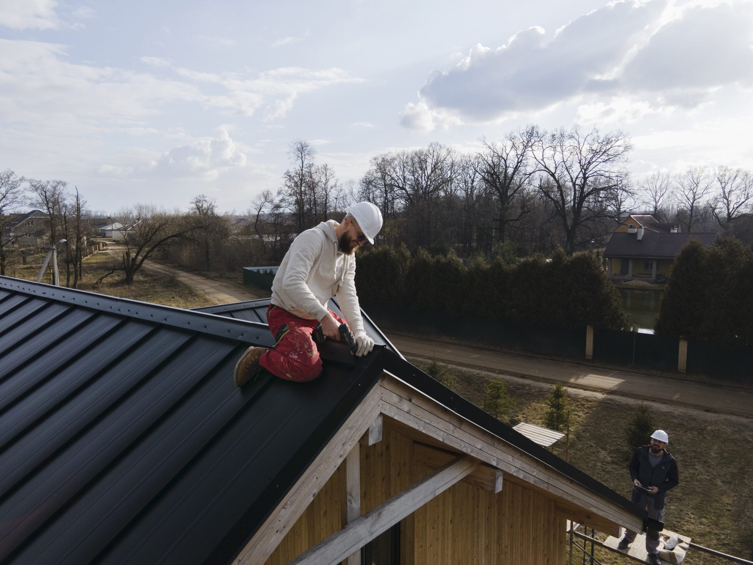 Image full-shot-roofer-working-with-helmet